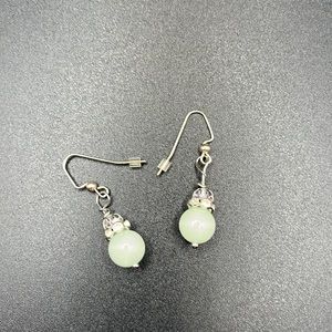 Earrings with light green beads